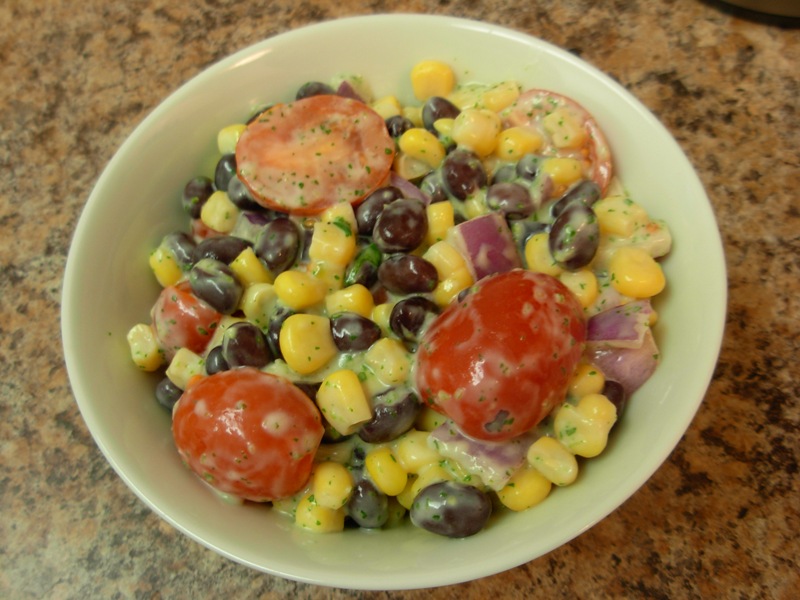 black bean, corn, tomato salad with cilantro cream